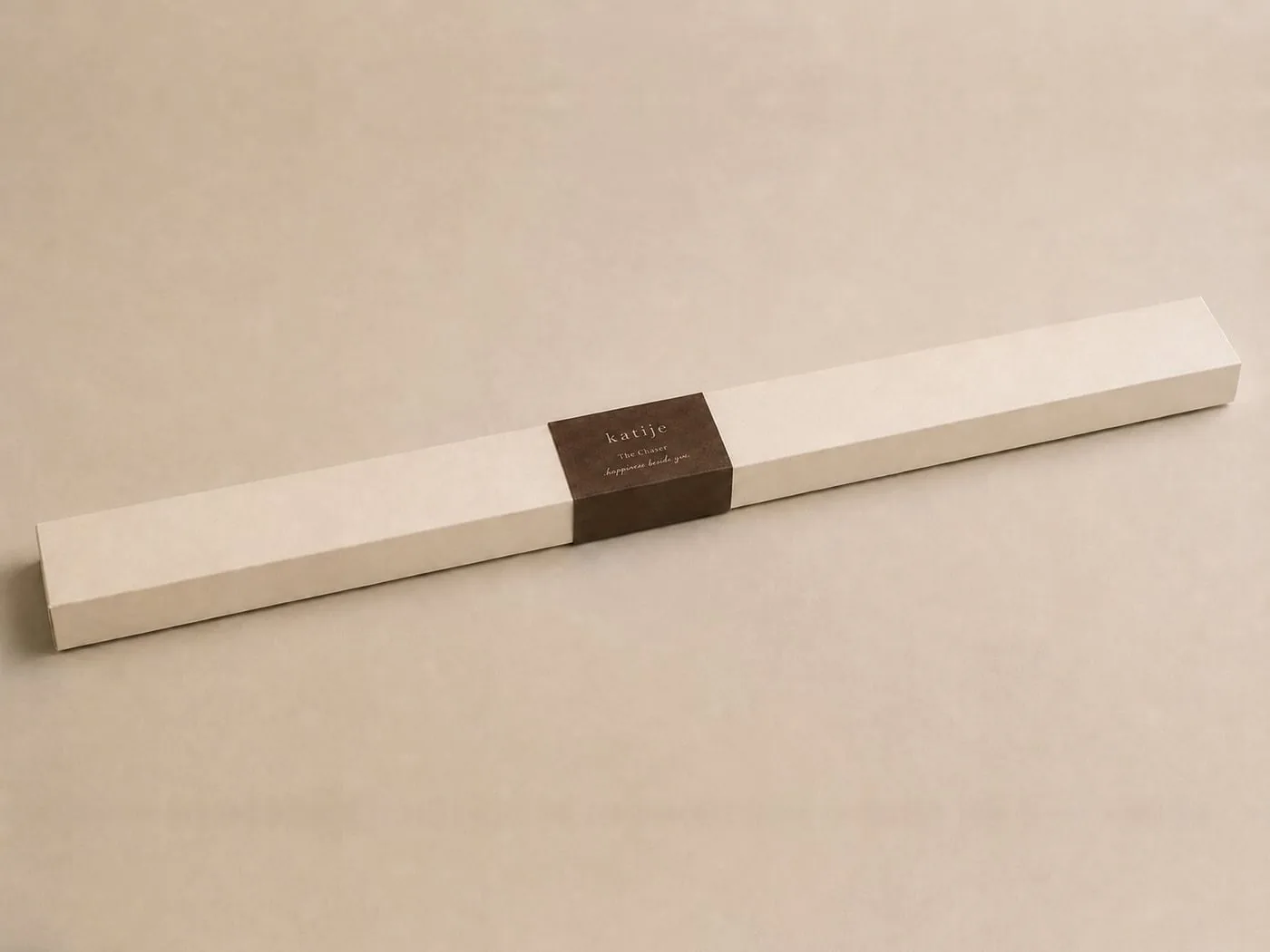 The Chaser box with its belly band