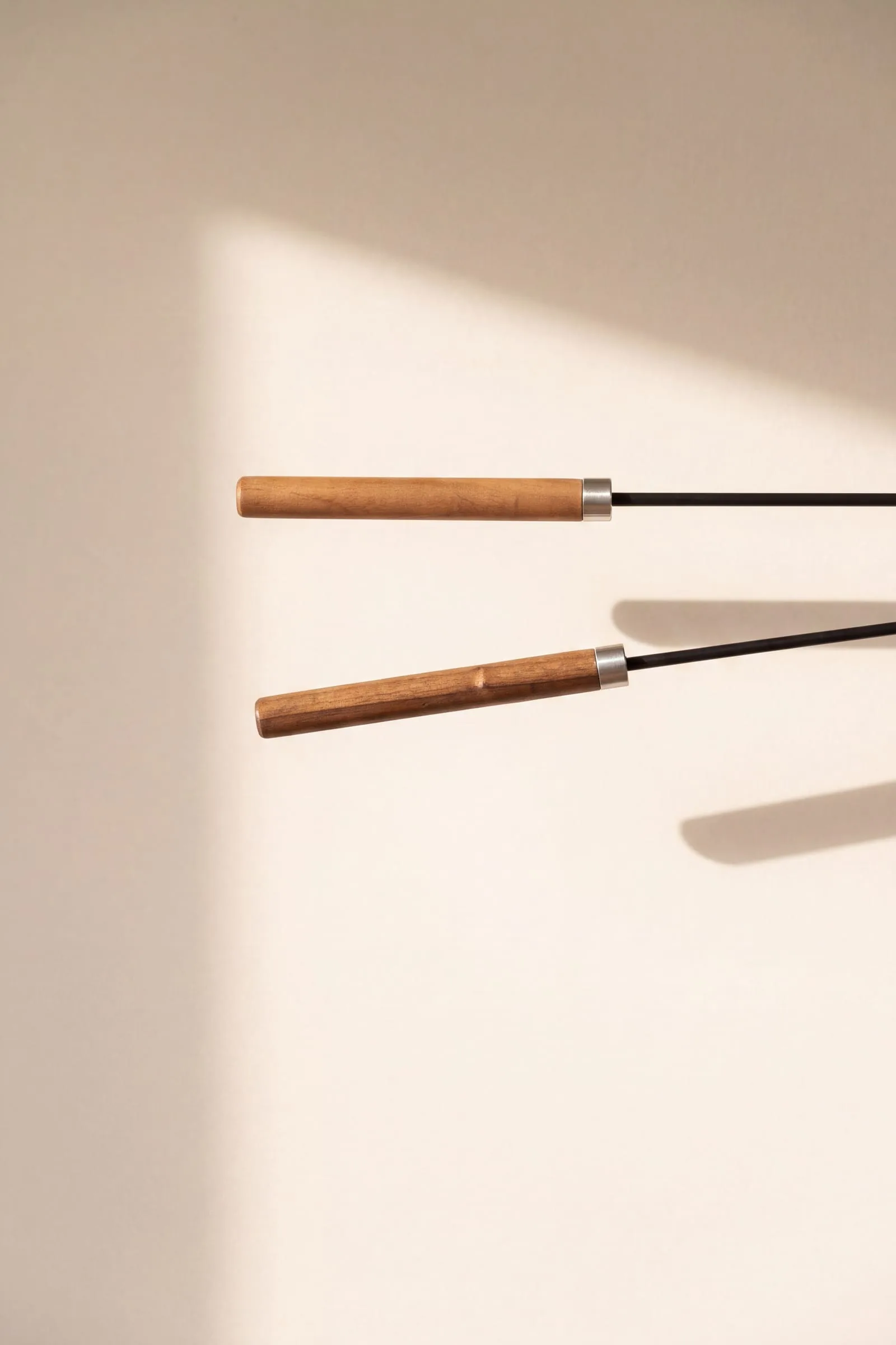 Two walnut handles side by side - no two grains alike